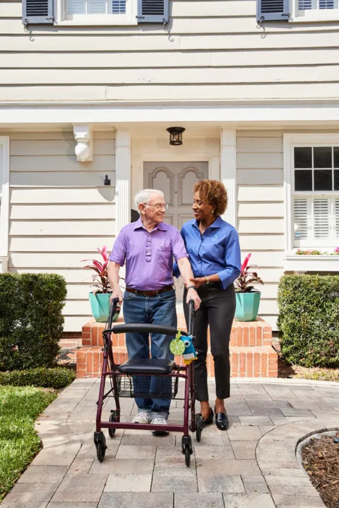 Comfort Keepers caregiver providing 24 hour in home care assistance