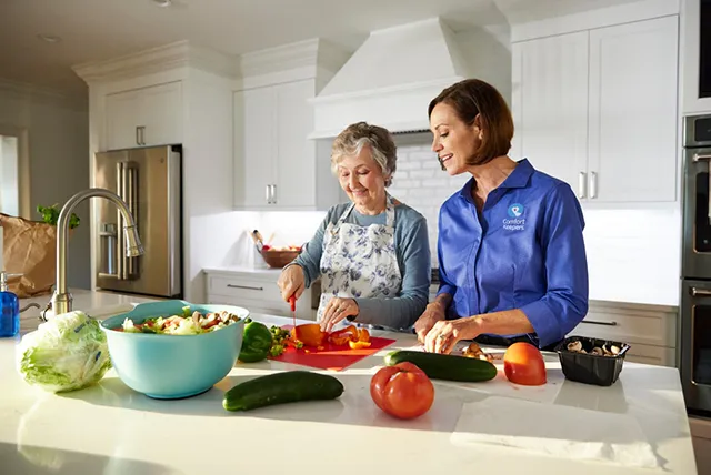 Senior receiving 24 hour in home care from a Comfort Keepers caregiver